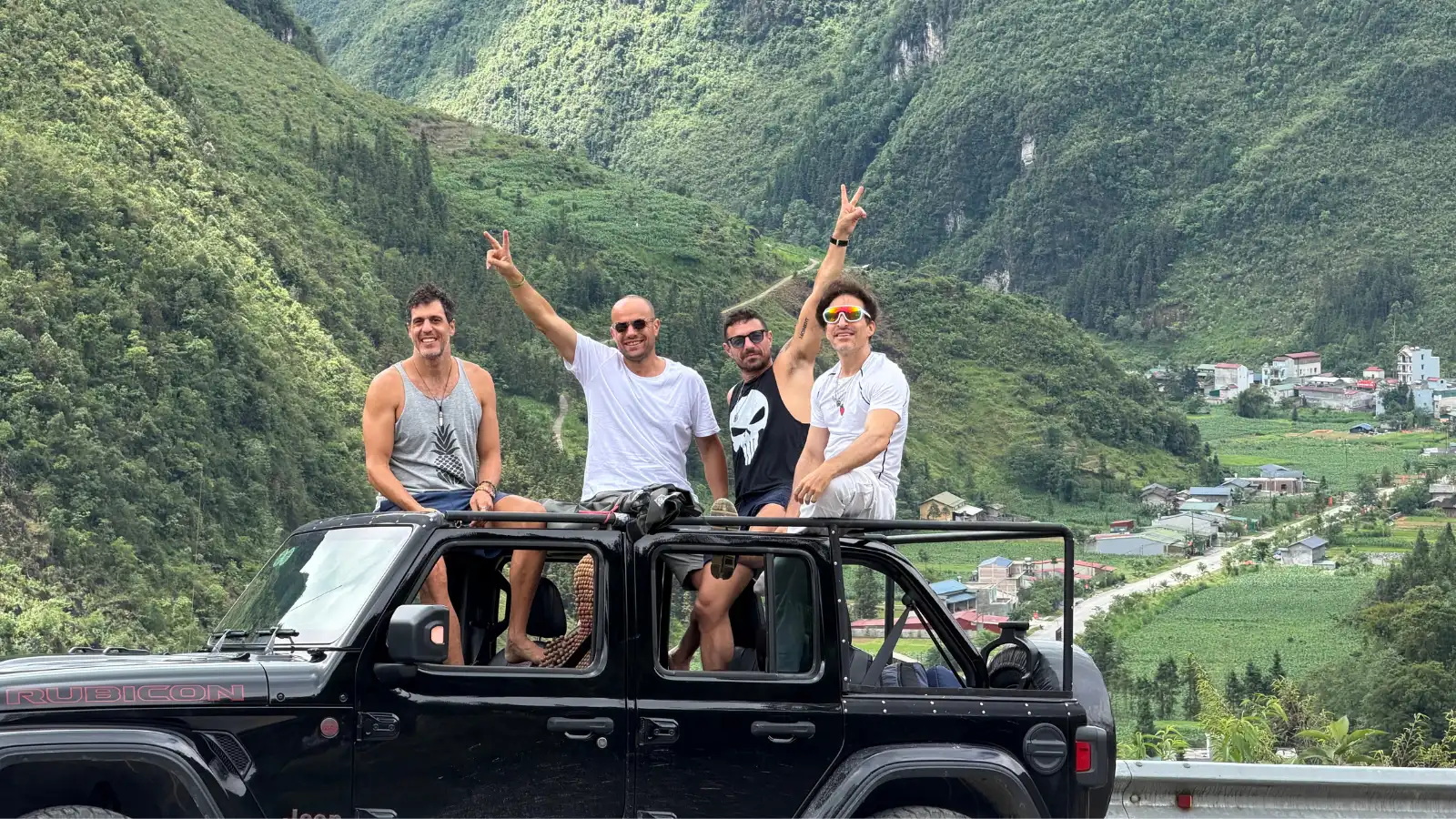 Jeep Wrangler Rubicon with open top on Ma Pi Leng Pass during a Ha Giang jeep tour