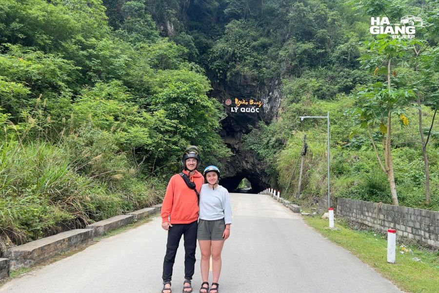 Entrance to Nguom Ngao Cave, Cao Bang, with jeep parked nearby
