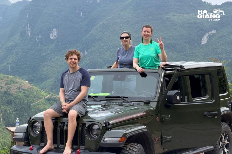 Satisfied ha giang jeep tour travelers after multi-day adventure and return journey