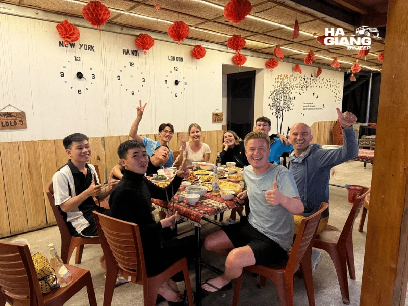 Homestay dinner with corn wine on a Ha Giang jeep tour