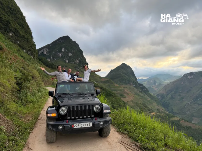 Open top Jeep Wrangler on a Ha Giang Loop tour with mountain views