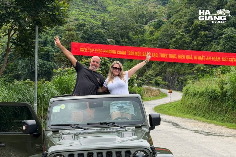 All weather soft top jeep on the Ha Giang Loop during cold mountain rain