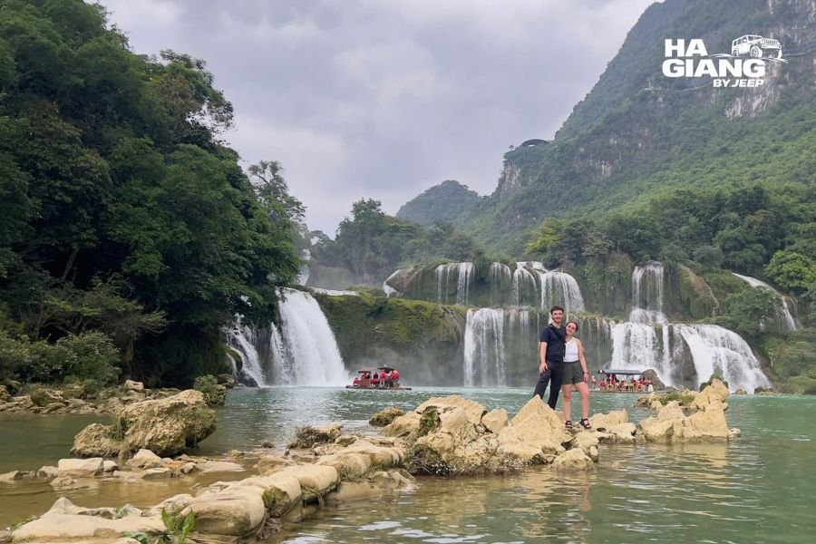 Ban Gioc Waterfall at full flow in the rainy season on a Ha Giang to Cao Bang jeep tour