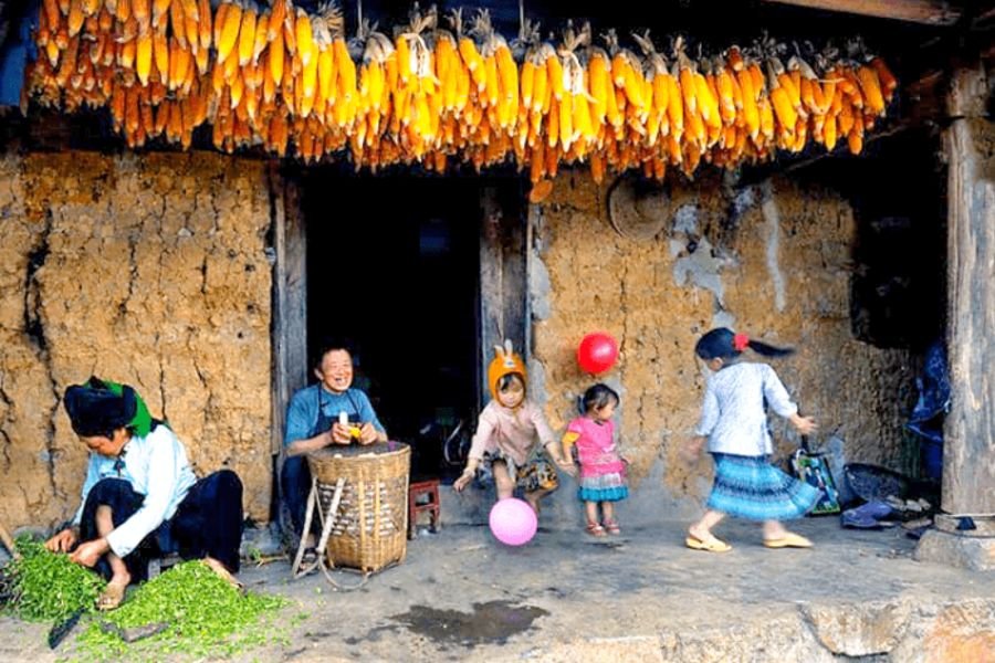 Courtyard with drying corn inside a family home in Lo Lo Chai Village