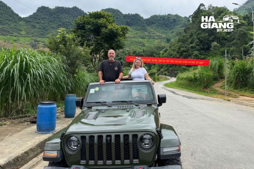 Guests relaxing in an open air jeep with valley views on the Ha Giang Loop
