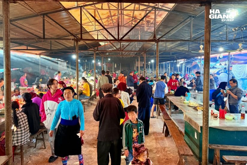 Ha Giang local market jeep tour souvenir shopping with travelers