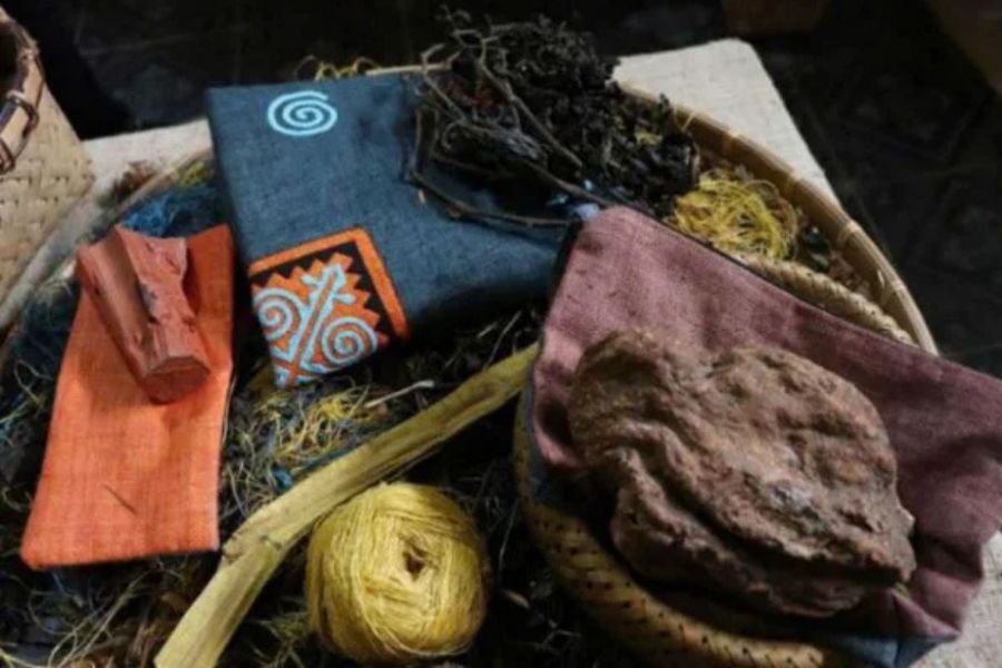 Handmade textiles for sale at the Lung Tam weaving cooperative shop
