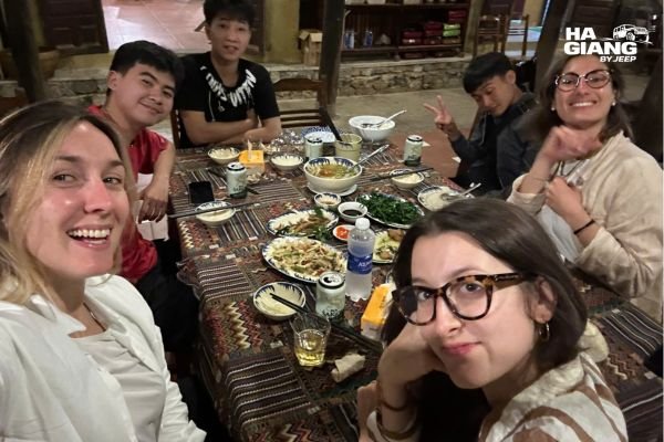 Homestay dinner with corn wine on a Ha Giang jeep tour