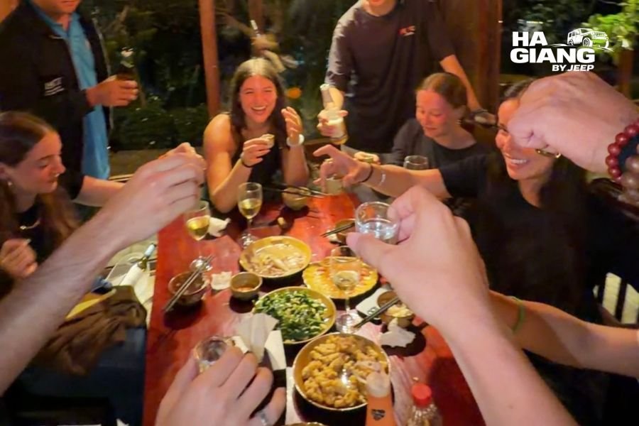 Homestay fire and corn wine during a Ha Giang jeep tour in winter
