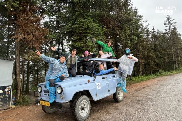 Local English speaking driver at the wheel on a Ha Giang jeep tour