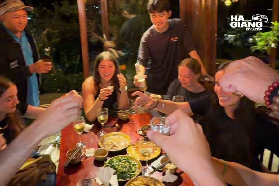 Local Ha Giang dishes and corn wine served near Meo Vac