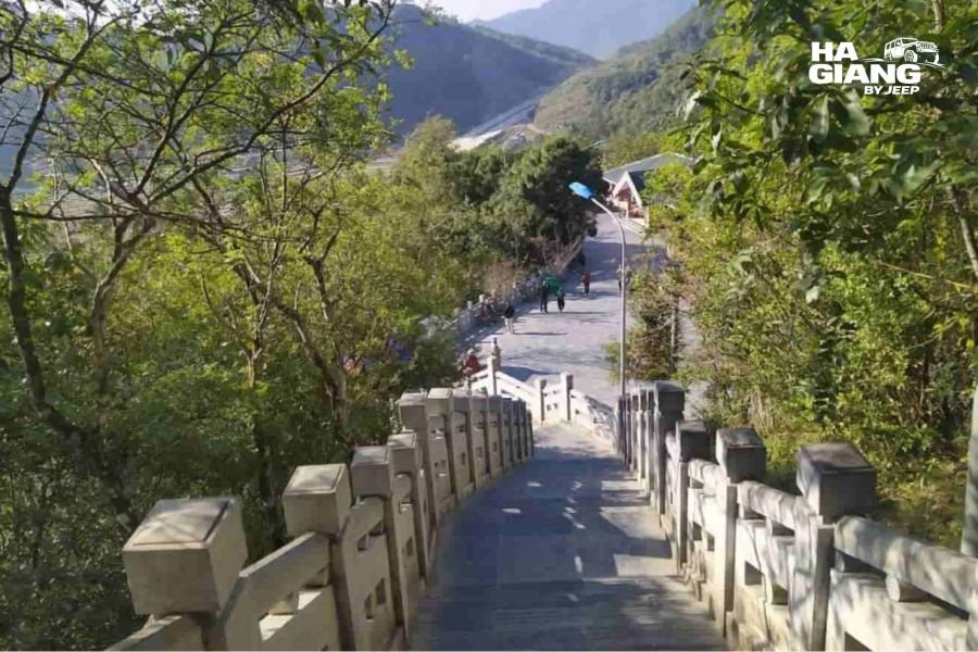 Stone steps climbing the hill to the Lung Cu Flag Tower