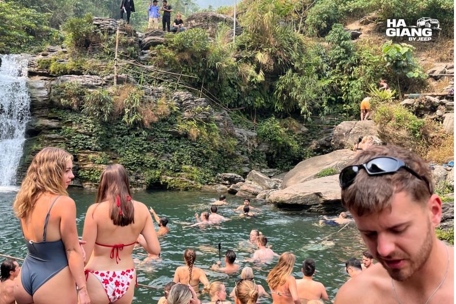 Swimming in the natural pool at Du Gia waterfall