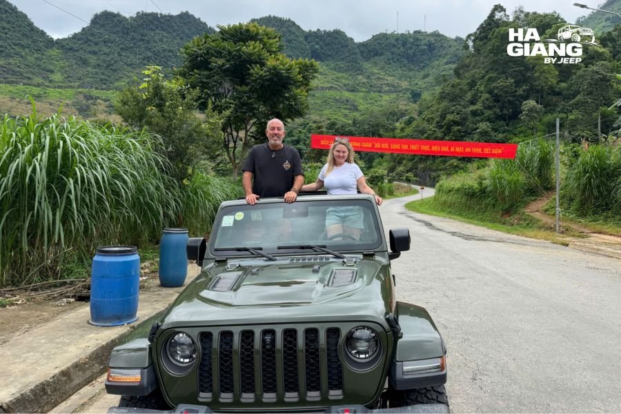 Travelers in a private open jeep in the mild spring weather of Ha Giang