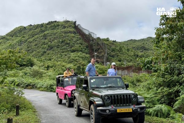 Travellers in an open air jeep on the Ha Giang Loop