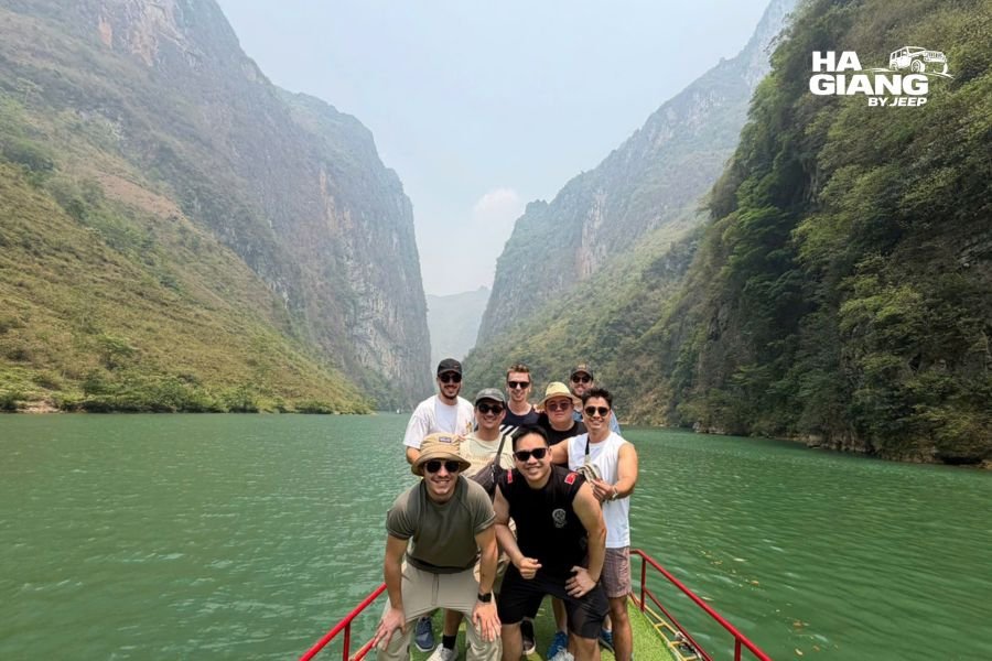 Turquoise water and limestone cliffs of Tu San Canyon