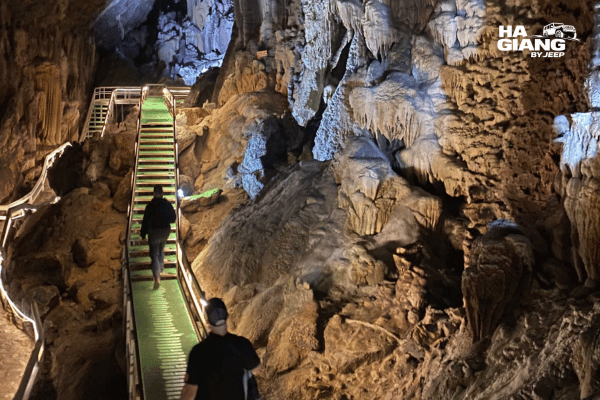 View from inside Lung Khuy Cave looking out through the entrance to the green valley below