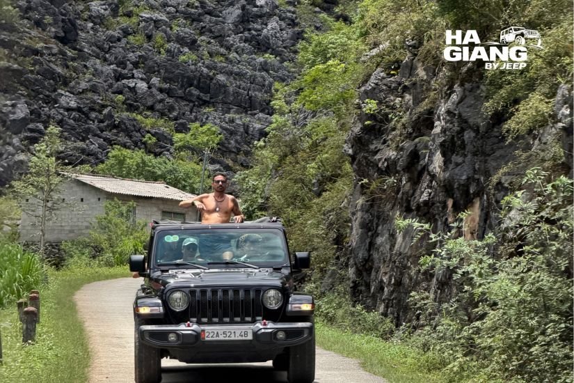 Ha Giang jeep tour review: guests in an open top jeep at Ma Pi Leng Pass