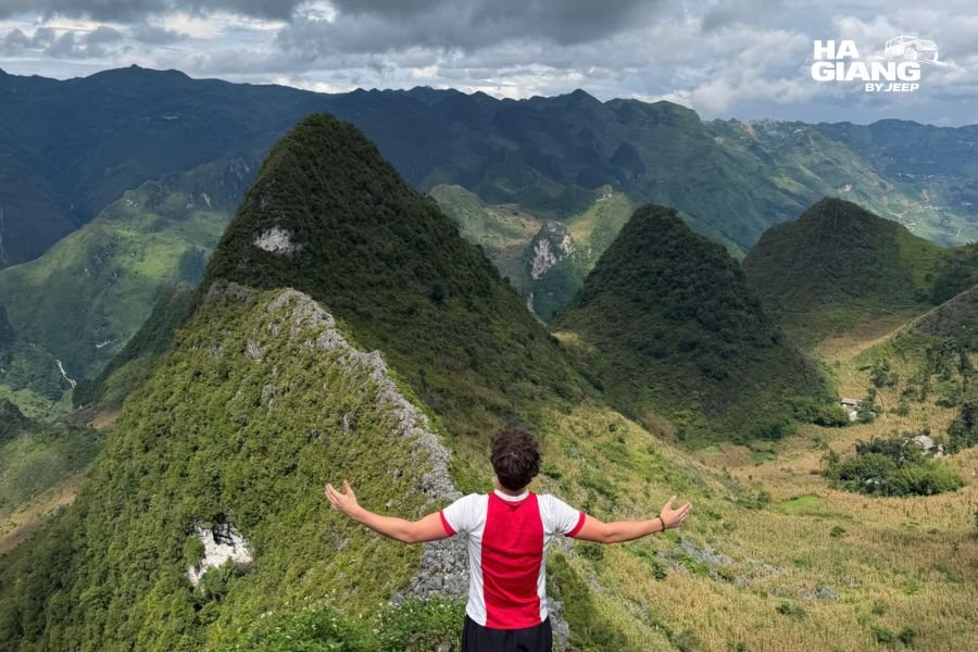 Aerial view of Ha Giang Loop switchbacks and karst landscape showing mountain curves