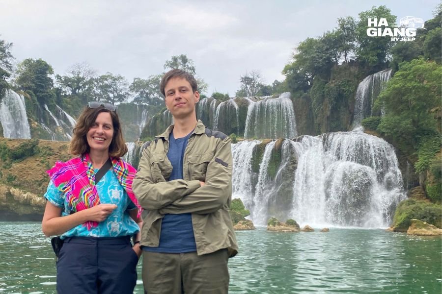 Ban Gioc Waterfall cascading dramatically down limestone cliffs in Cao Bang Province