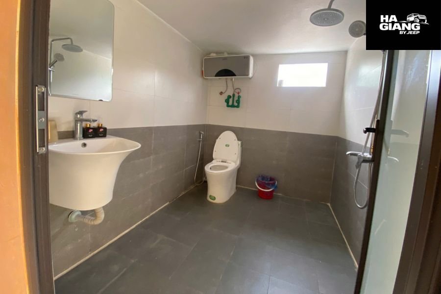 Basic but clean bathroom in Ha Giang Loop homestay
