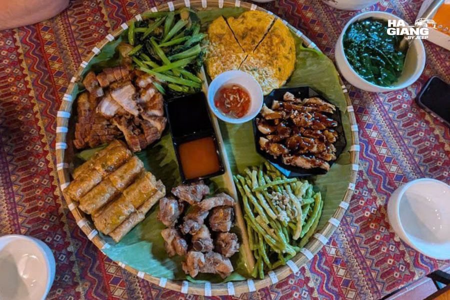 Com lam bamboo rice and grilled pork at a roadside stop on a Ha Giang jeep tour