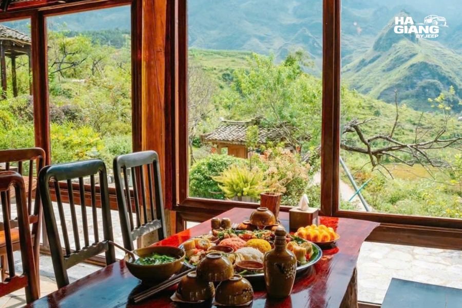 Cozy Ha Giang homestay room interior with mountain view window and traditional Vietnamese décor