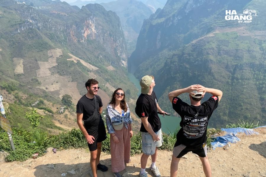 Group looking out over the Nho Que canyon from Ma Pi Leng Pass