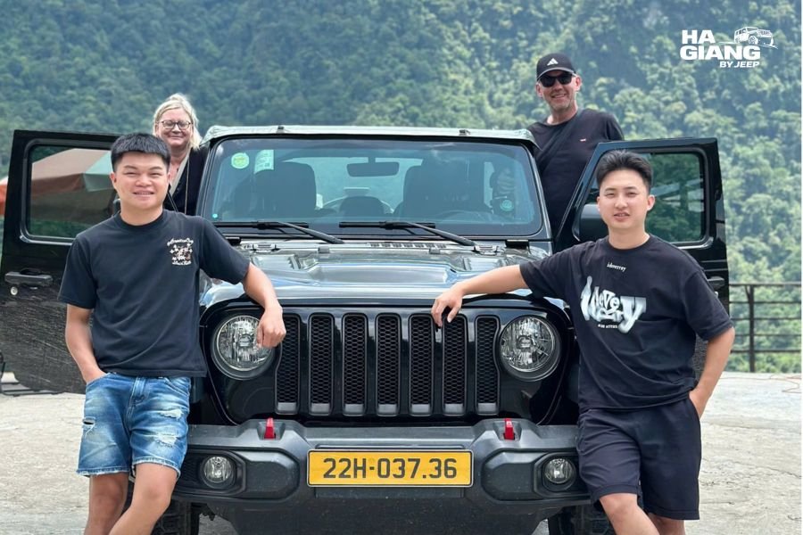 Jeep on Ma Pi Leng Pass Ha Giang at sunrise with mountain views