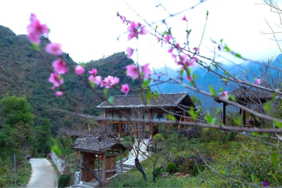 Mountain village landscape visible from homestay, showing context of homestay location