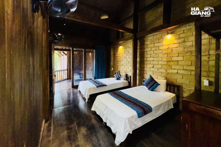 Private homestay room with twin beds on the Ha Giang Loop