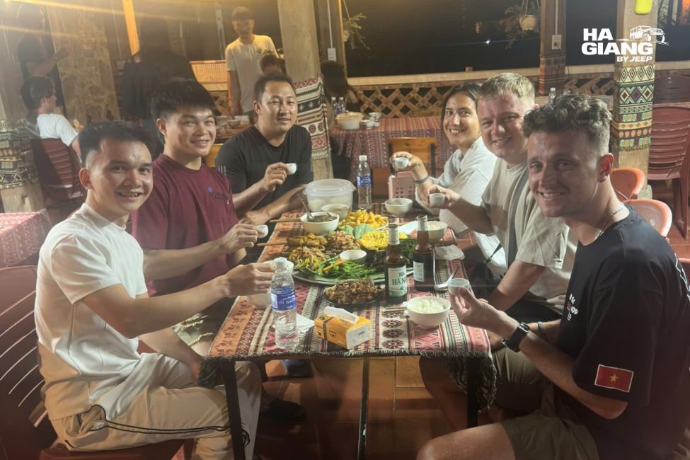 Shared homestay dinner spread on the Ha Giang Loop