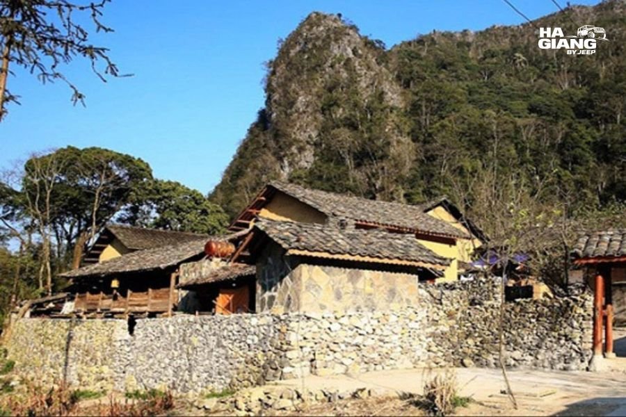 Stone walled Hmong houses in the Sung La valley on the road to Pho Bang