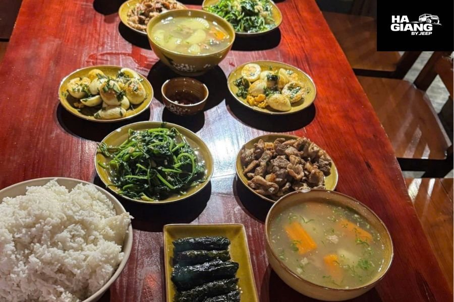 Traditional family dinner at Ha Giang Loop homestay with local dishes