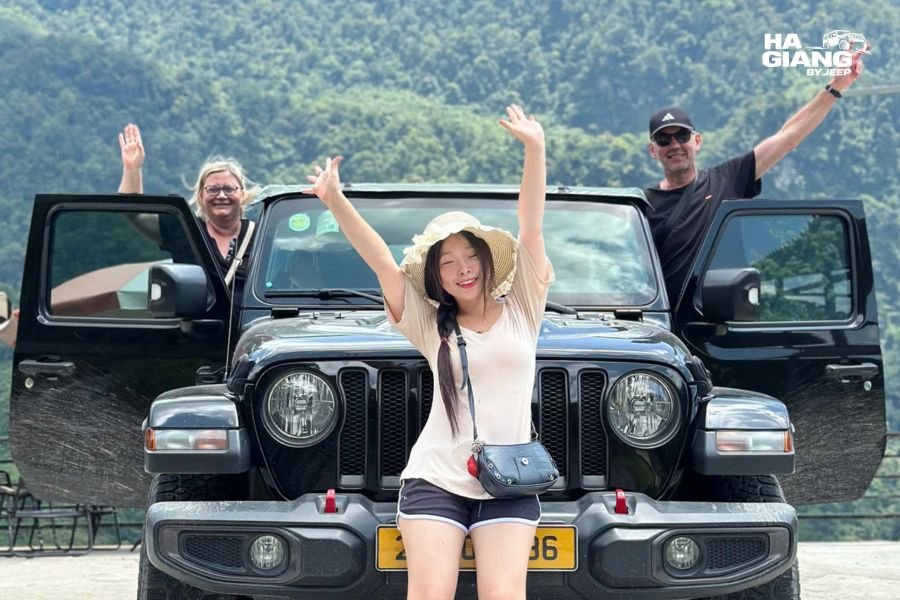 Travelers posing with jeep on Ha Giang Loop