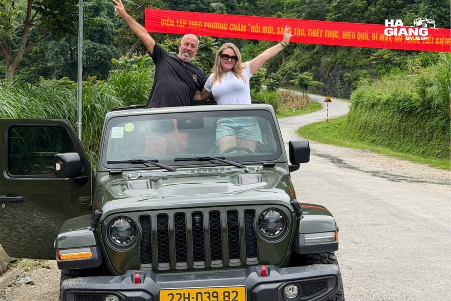 Jeep Wrangler Rubicon with soft-top down, ready for Ha Giang adventure with open-air comfort and off-road capability