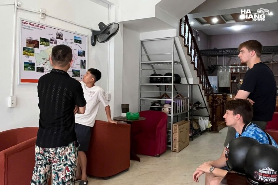 A booking confirmation on a phone for a Ha Giang jeep tour
