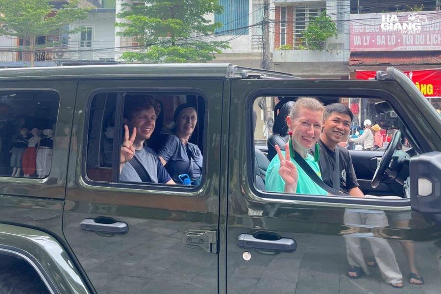 A private jeep waiting in Ha Giang City for last minute tour guests