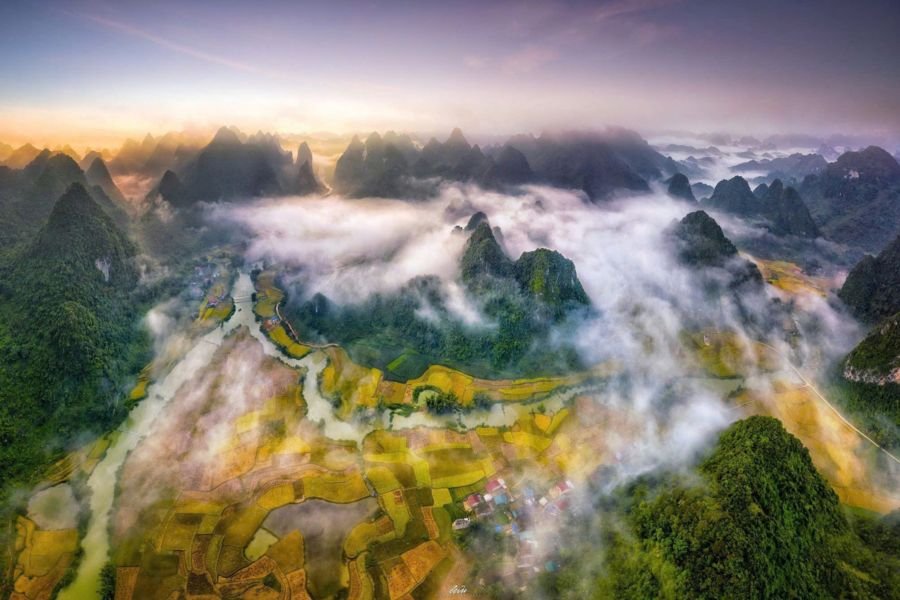 Early morning mist over the fields of Phong Nam Valley in Cao Bang