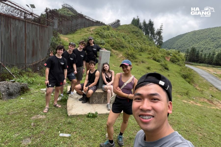English speaking local driver talking with travelers in Ha Giang