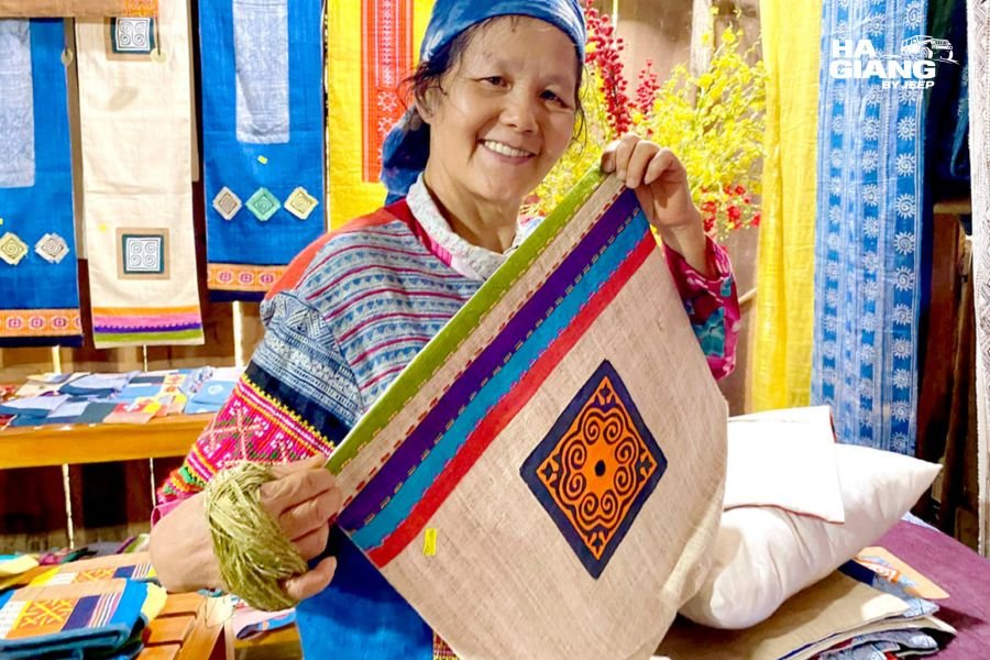 Finished hemp textiles from Hmong linen weaving folded at a village cooperative in Ha Giang