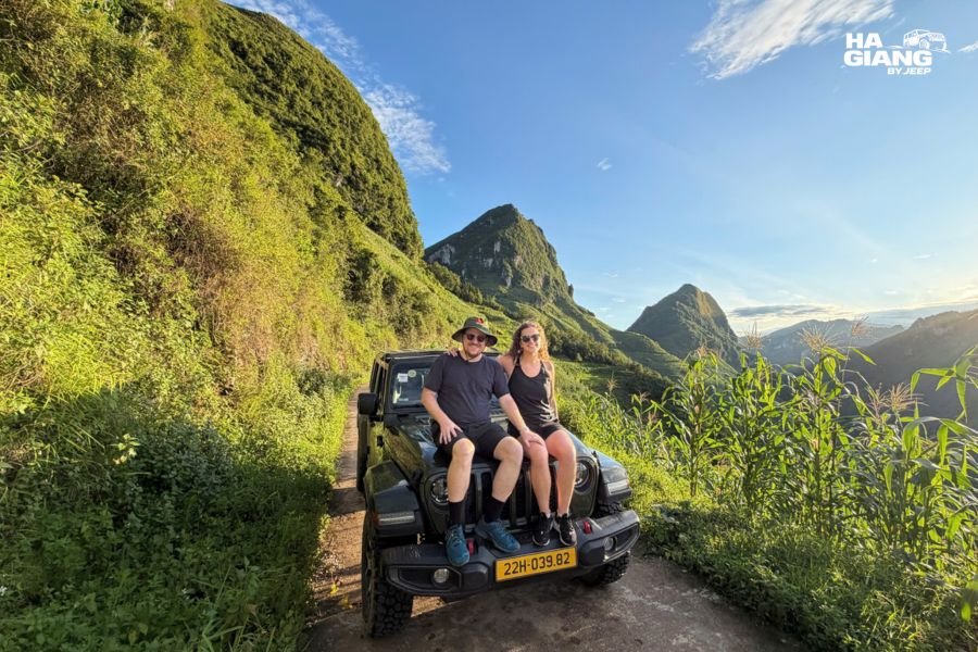 Jeep on the road below Ma Pi Leng Pass above the Nho Que River