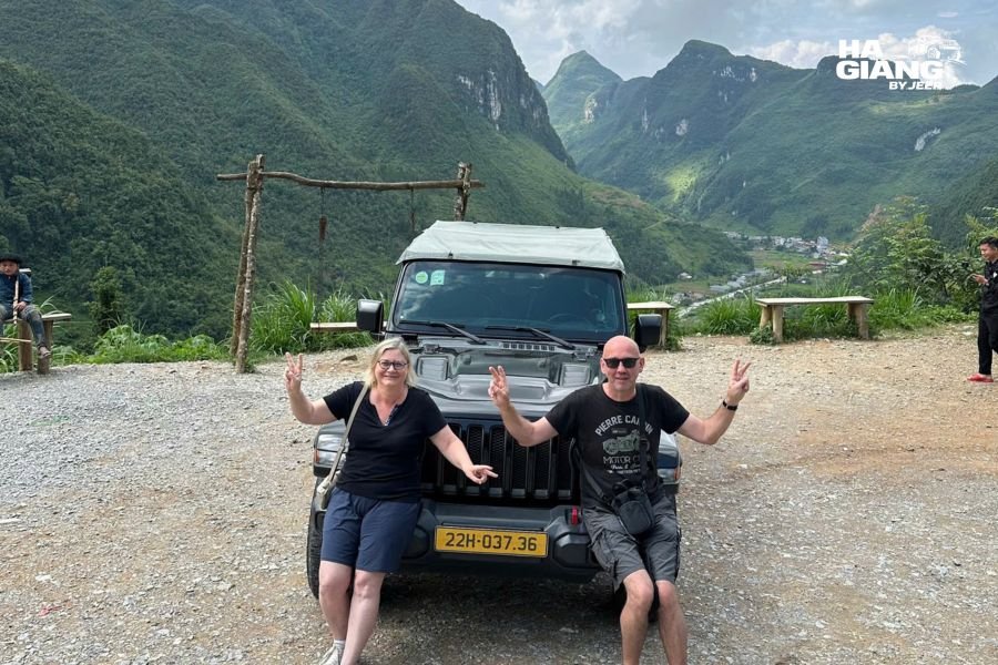 Jeep parked outside a weaving village in Quan Ba during a Ha Giang jeep tour