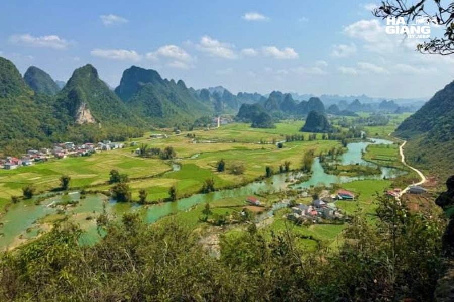 Limestone towers rising from the flat valley floor at Phong Nam near Ban Gioc, Cao Bang