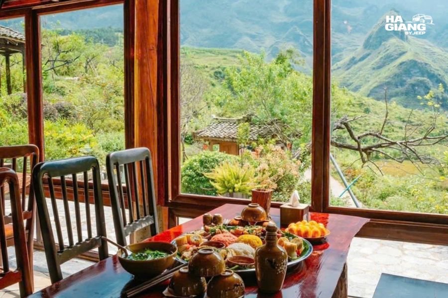Travelers and their local driver at a roadside lunch stop in Ha Giang