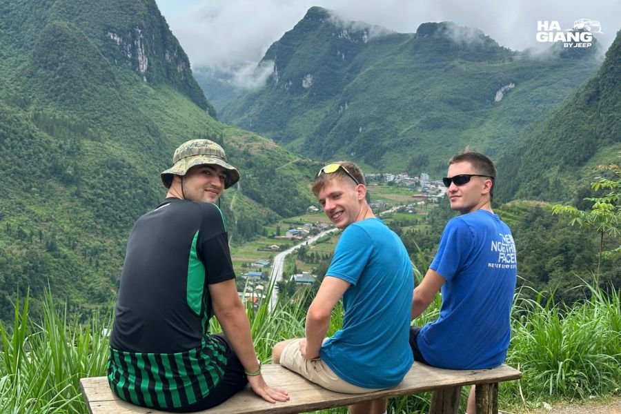 Travelers at the Chin Khoanh Pass viewpoint on the Ha Giang Loop