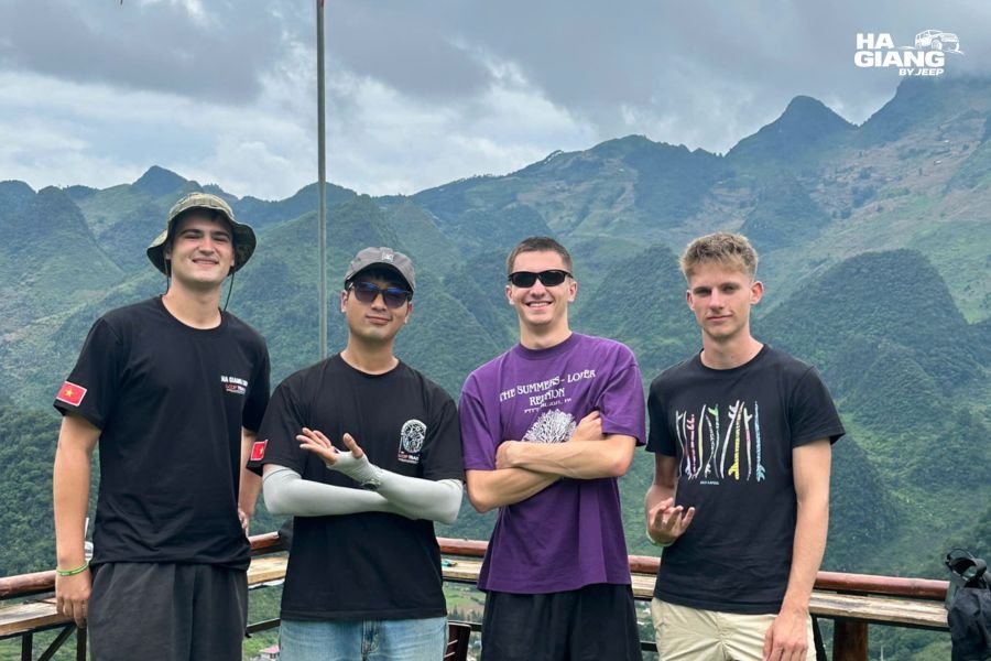Travelers meeting their local driver at the start of a Ha Giang jeep tour