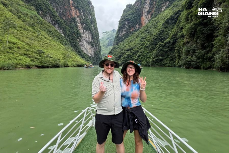 A couple on a boat in Tu San Canyon on the Nho Que River, Ha Giang