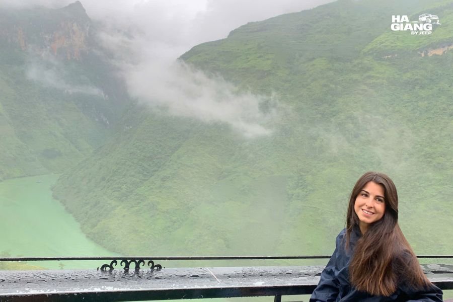 Breath visible in cold air on a Ha Giang highland pass, dawn temperature
