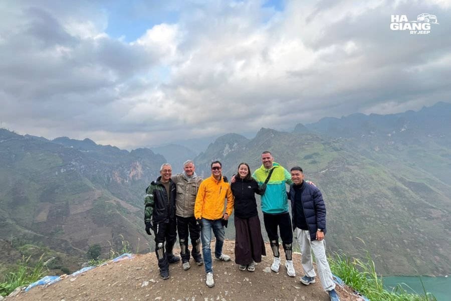Ha Giang jeep tour January: Jeep Wrangler Rubicon driving the karst loop in winter haze